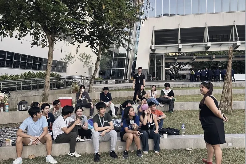 Members posing on campus