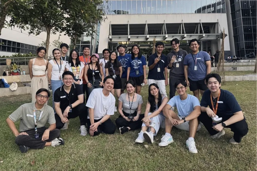 A-HOUSE members posing together outdoors